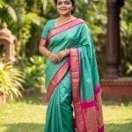 Aqua Blue Kanjivaram Silk Saree with Pink Zari Border
