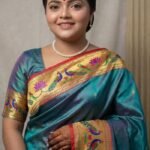 Teal Blue Paithani Pure Silk Saree with Peacock and Lotus Motifs